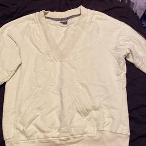 Lime green long sleeve shirt with hoodie pockets. Size Large. Champion Brand